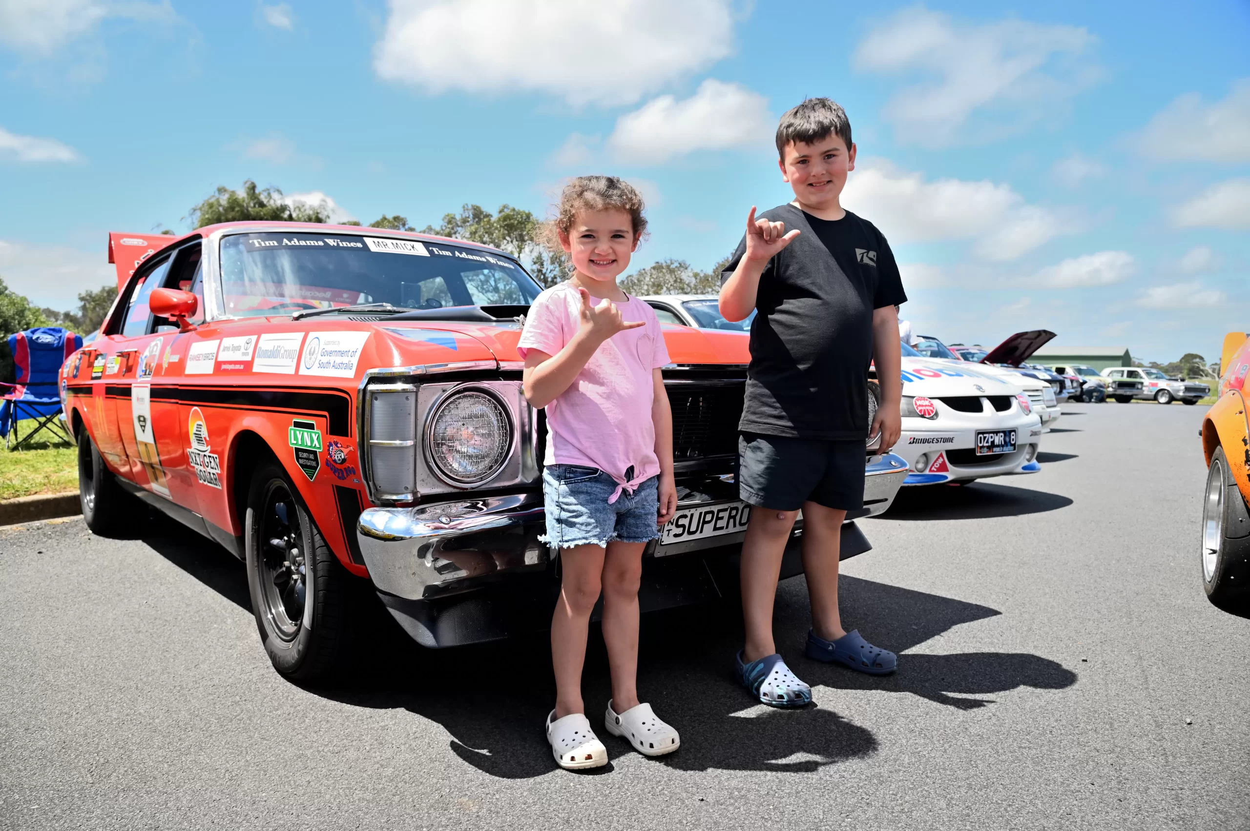 Variety Aussie Muscle Car with two happy children